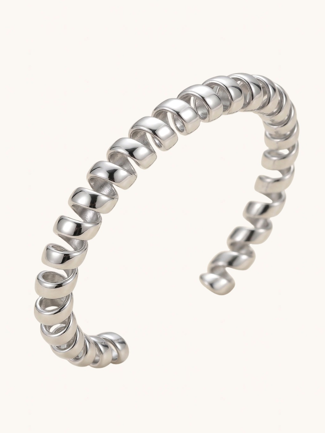 Closeup of Twila Spiral Bangle in Silver-Tone Metal Comfort Fit 18k Gold Plated Steel | Hypoallergenic Tarnish Resistant Sweat Water 8 inches 19.6gms Stainless
