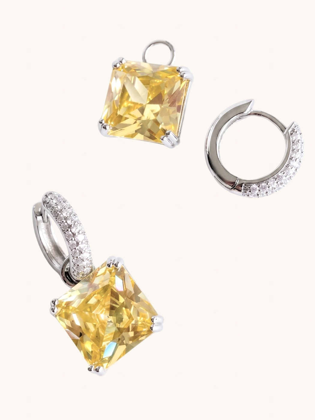 Closeup of Valery Yellow Drop Huggie Hoop Earrings in Rhodium Plated Metal Jewelry for Pierced Ears Brass 2.5 cm 9.5gms