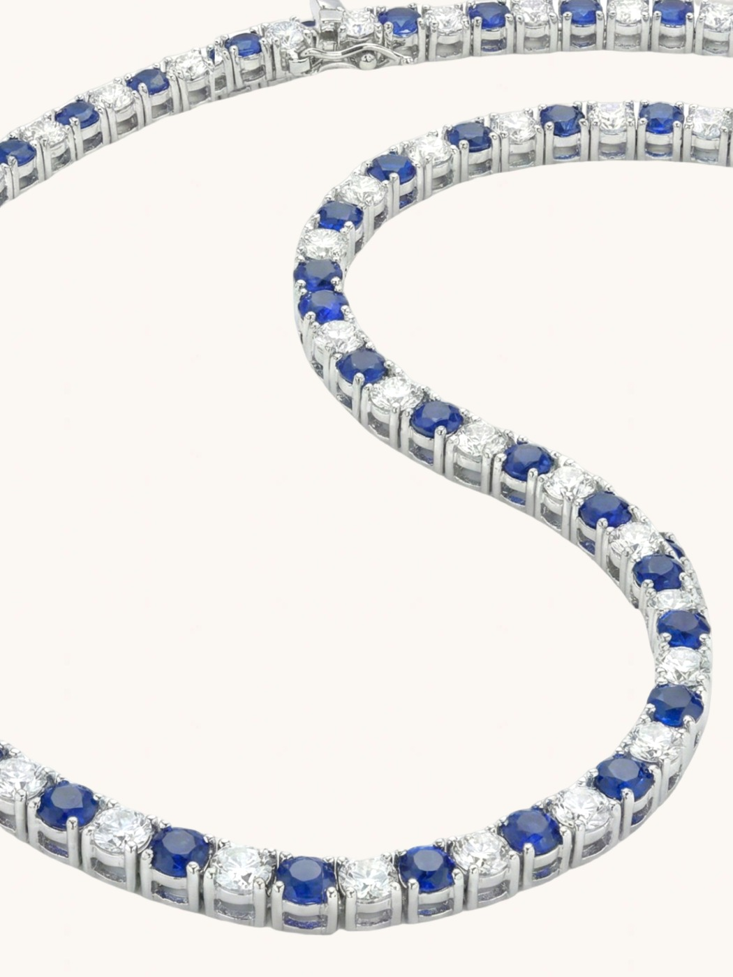 Closeup of Vivienne Tennis Necklace in rhodium Plated Metal-Blue Comfort Fit Gold Brass Metal Mix