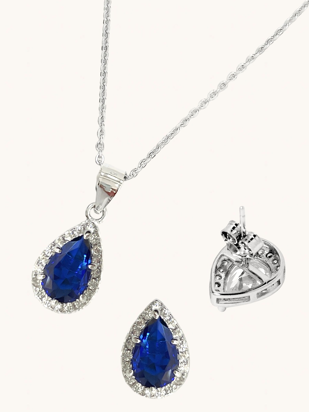 Closeup of Zia Drop Pendant Necklace & Stud Earrings in 925 Sterling Silver - Blue Fixed Length Metal 16 inches 4.6gms