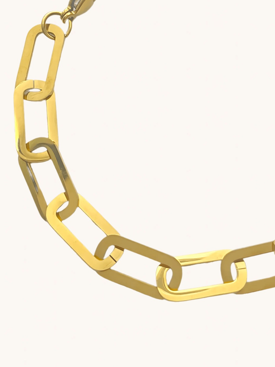 Closeup of Clarisse Chunky Paperclip Bracelet in 18k Gold-Plated Metal Adjustable Length Gold Plated Steel | Hypoallergenic Tarnish Resistant Sweat Water Eco - Friendly 7 inches 8.3gms
