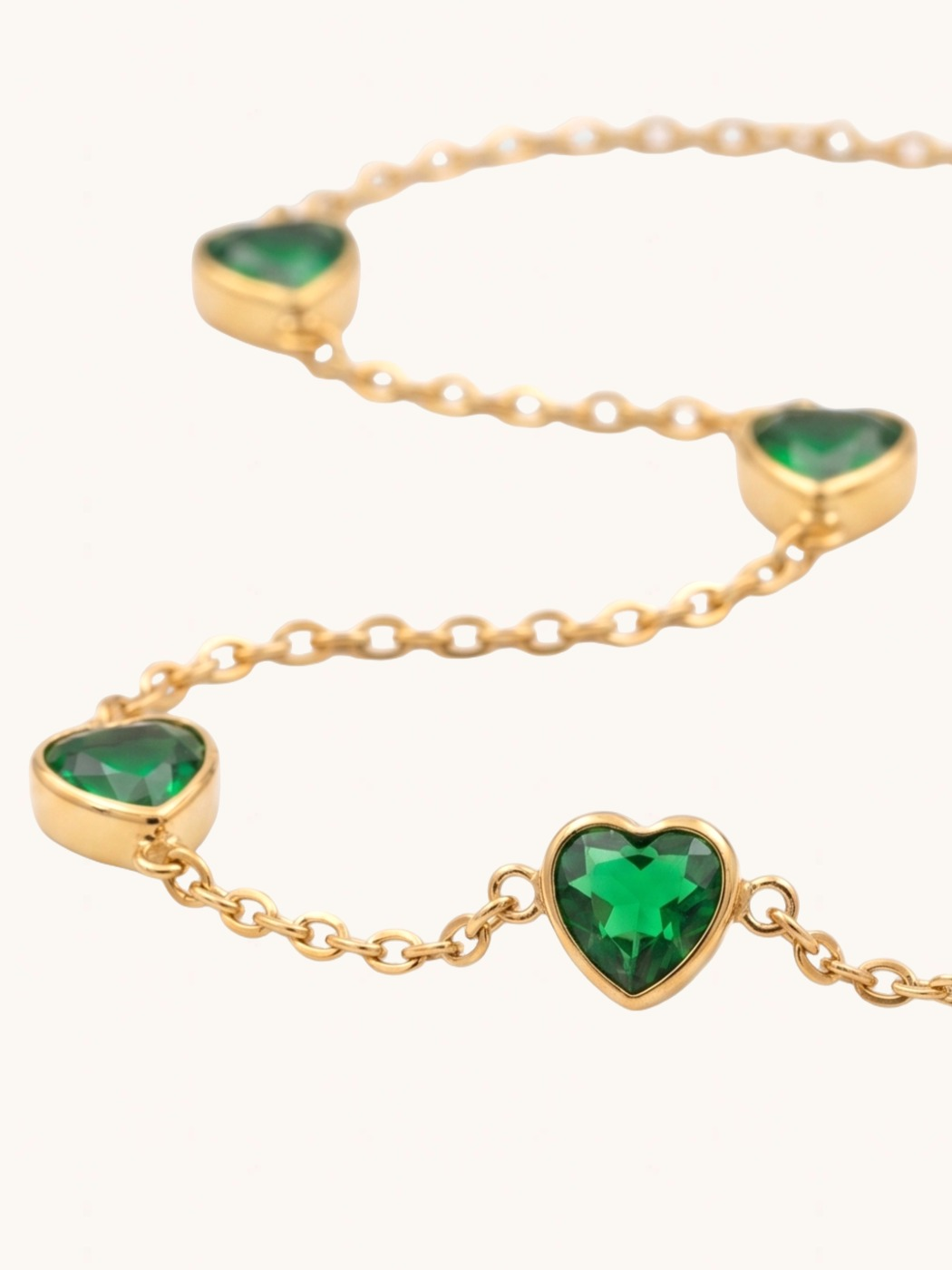 Bezel Heart Bracelet on a plain cream background, view 2