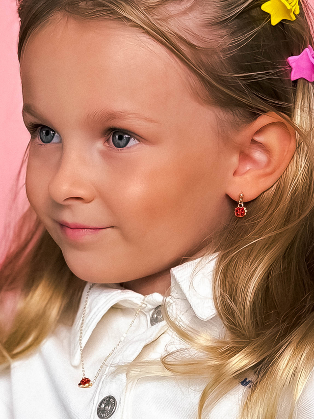 Model Wearing Little Princess Lady Bug Earrings in 18k Gold plated Sterling Silver Jewelry for Pierced Ears Plated 925 Metal One Size 1.7gms