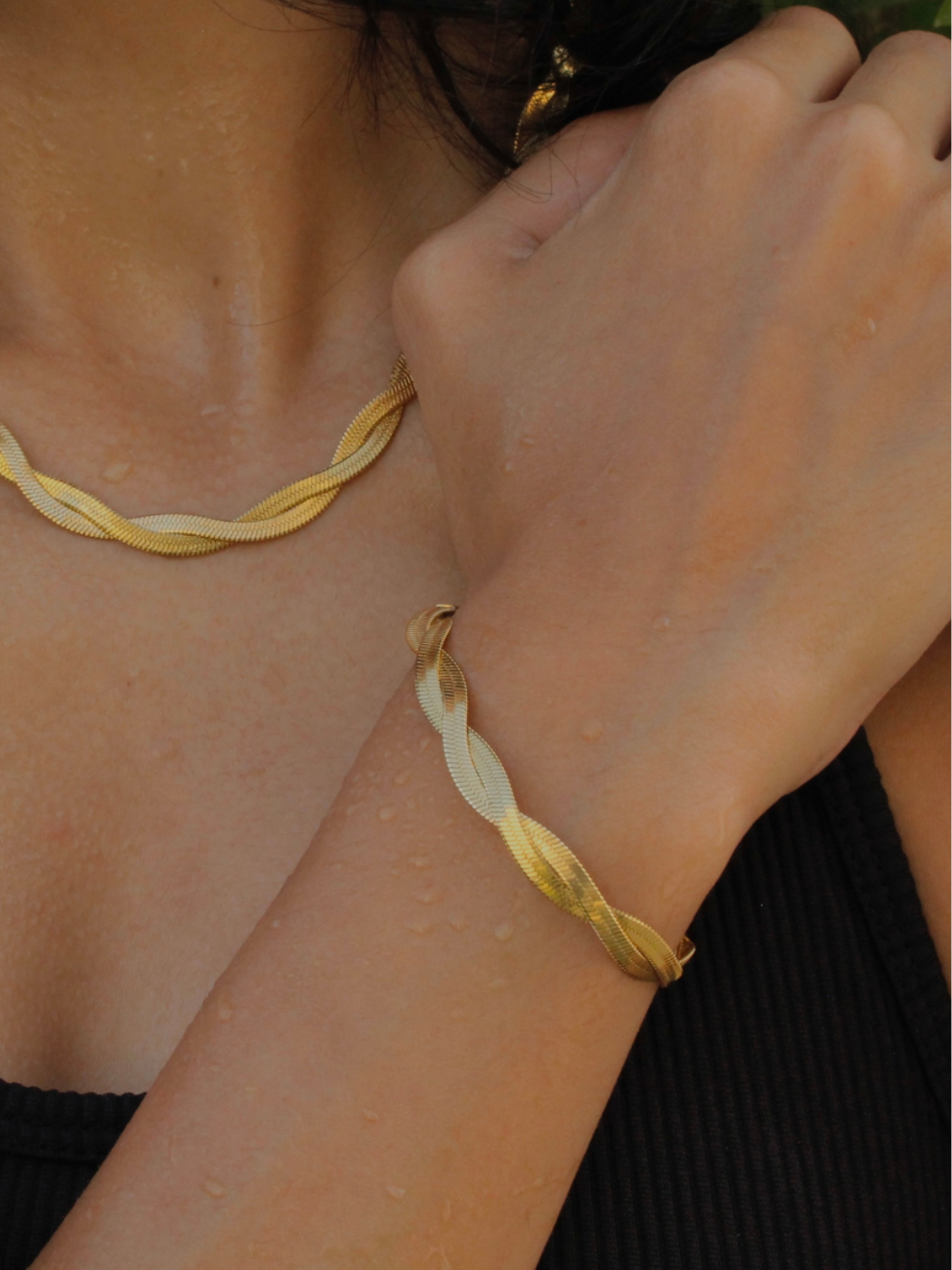Model Wearing Raia Ripple Bracelet in 18K Gold Plated Metal Adjustable Length 18k Steel | Hypoallergenic Tarnish Resistant Sweat Water Eco - Friendly One Size 5.1gms