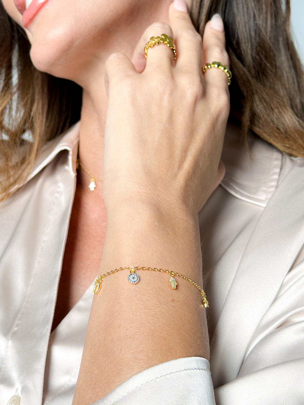 Model Wearing Rayan Charm Bracelet in 18k Gold Plated Sterling Silver Adjustable Length 925 Metal Stone 20 cm 2.3gms