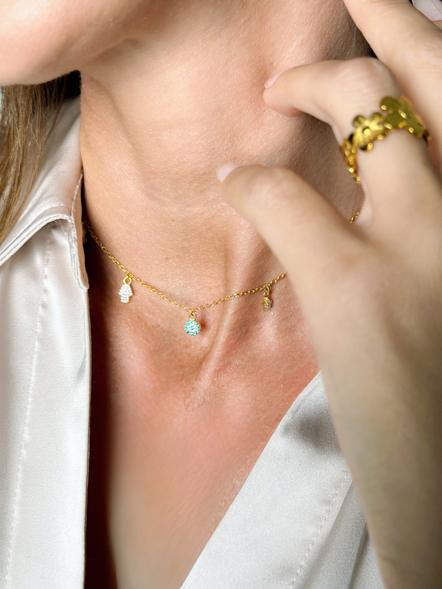 Model Wearing Rayan charm necklace in 18k gold plated silver Adjustable Length Gold Plated 925 Sterling Silver Metal One Size 3.3gms