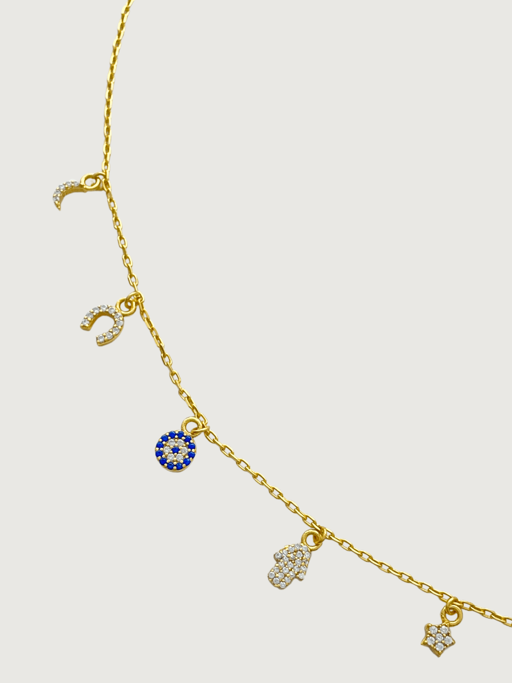 Closeup of Rayan Charm Bracelet in 18k Gold Plated Sterling Silver Adjustable Length 925 Metal Stone 20 cm 2.3gms