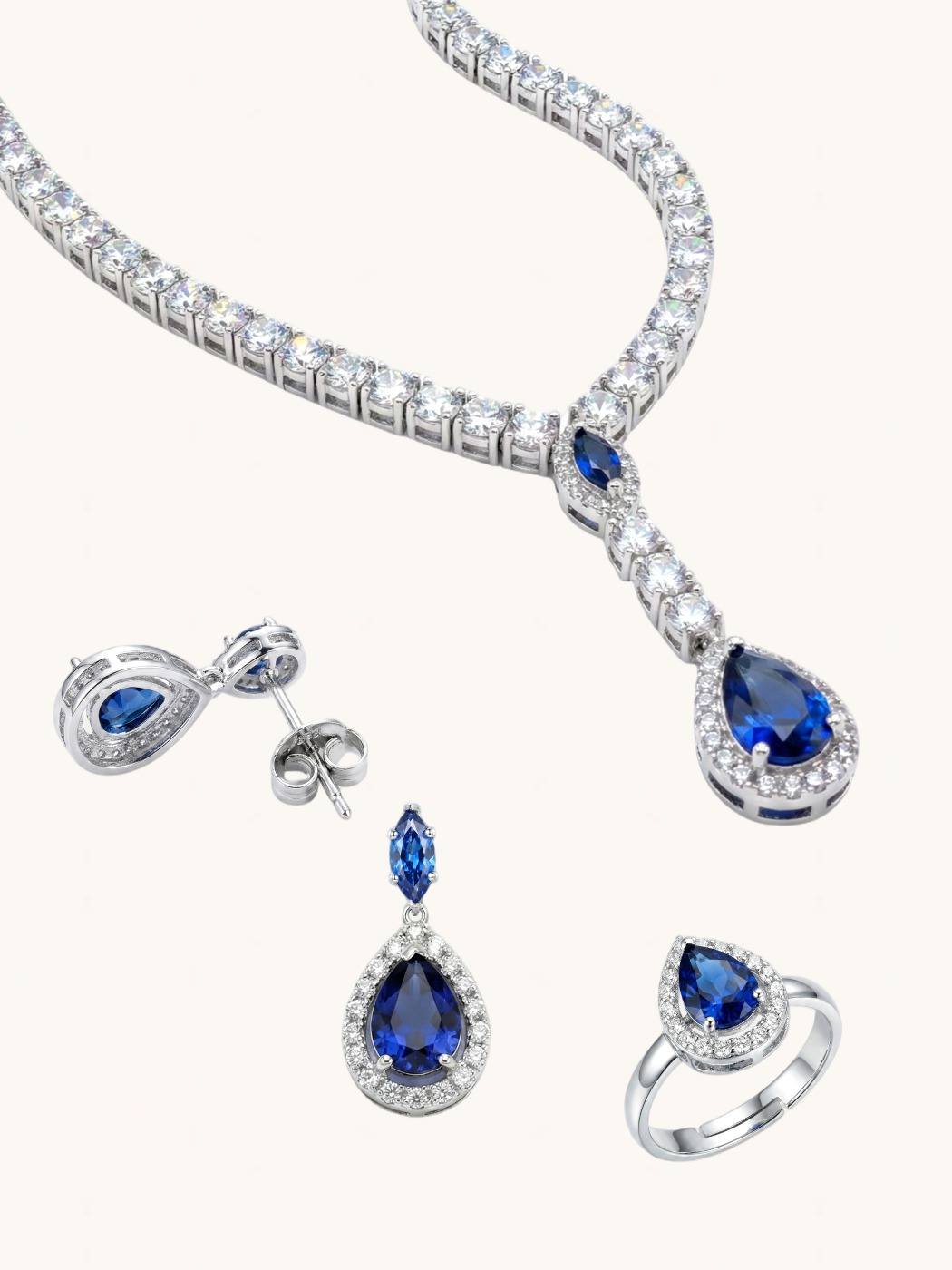 Closeup of Nova Blue Drop Necklace set with Earrings and Ring in Rhodium Plated Metal Comfort Fit Copper Mix