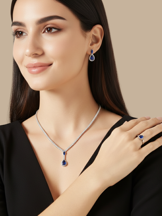 Model Wearing Nova Blue Drop Necklace set with Earrings and Ring in Rhodium Plated Metal Comfort Fit Copper One Size 18.8gms Mix