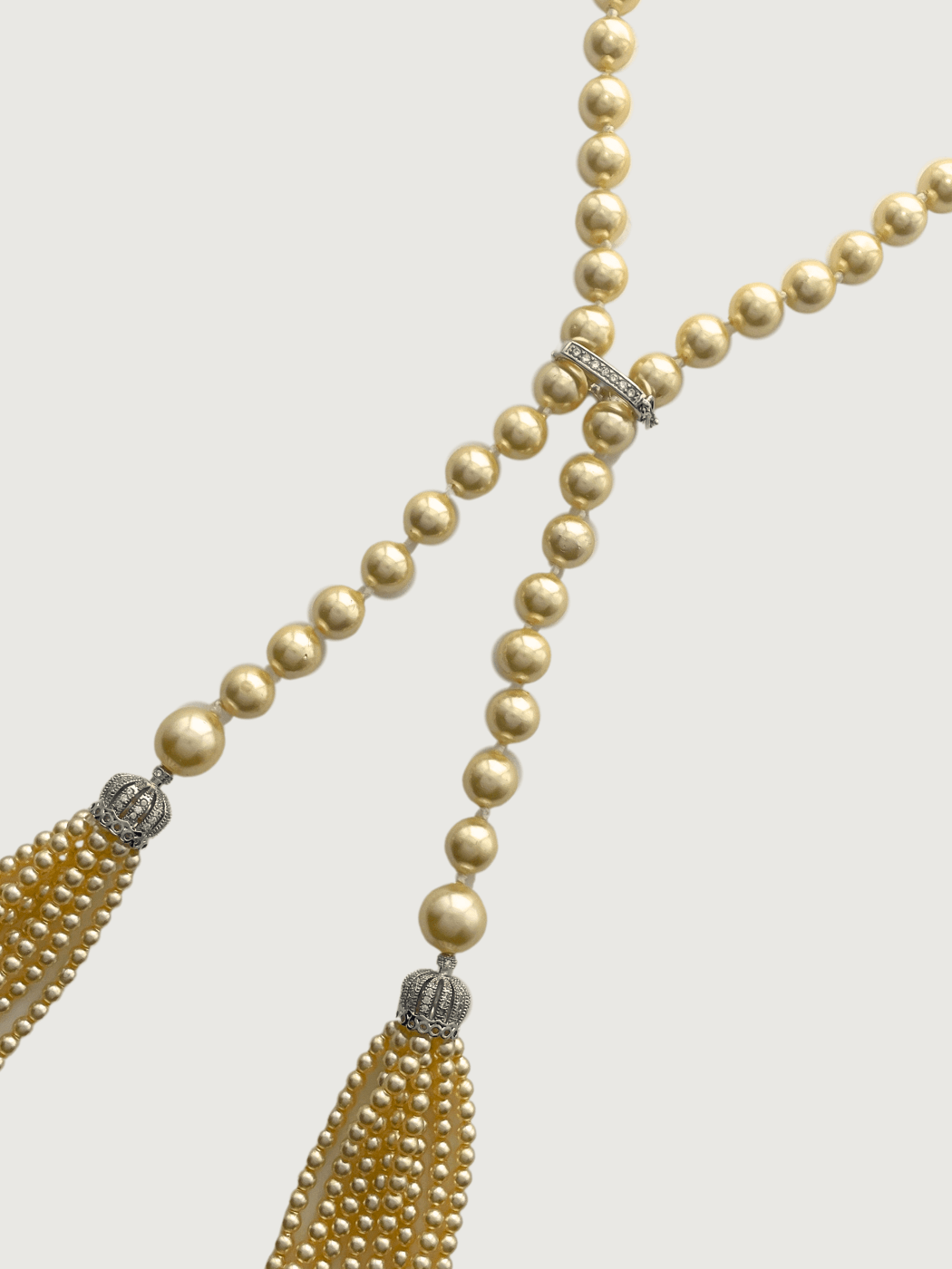 Closeup of Hessa Cream Pearl Tassel Necklace with Brass clip Fixed Length Rhodium Plated Metal Stone One Size 72.1gms