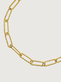 Closeup of Celine Paperclip Bracelet in 18K Gold Plated Metal Adjustable Length 18k Steel | Hypoallergenic Tarnish Resistant Sweat Water Eco - Friendly One Size 3.1gms