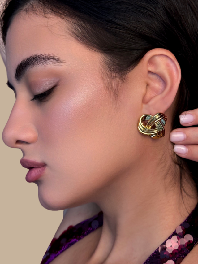 Model Wearing Julia Knot Stud Earrings Jewelry for Pierced Ears 18k Gold Plated Steel | Hypoallergenic Tarnish Resistant Sweat Water Eco - Friendly One Size 19.5gms Stainless