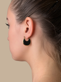 Model Wearing Joana Black Hoop Earrings Jewelry for Pierced Ears 18k Gold Plated Steel | Hypoallergenic Tarnish Resistant Sweat Water Eco - Friendly One Size 5.9gms Stainless