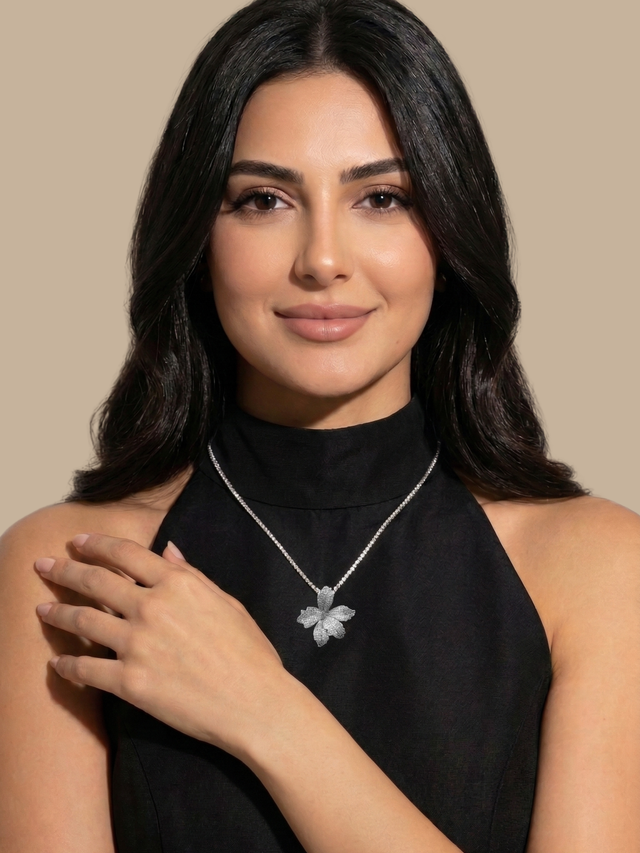 Model Wearing Orchid Bloom Brooch Pendant in Rhodium-Plated Metal Comfort Fit 925 Sterling Silver Chain Rhodium Plated Brass One Size