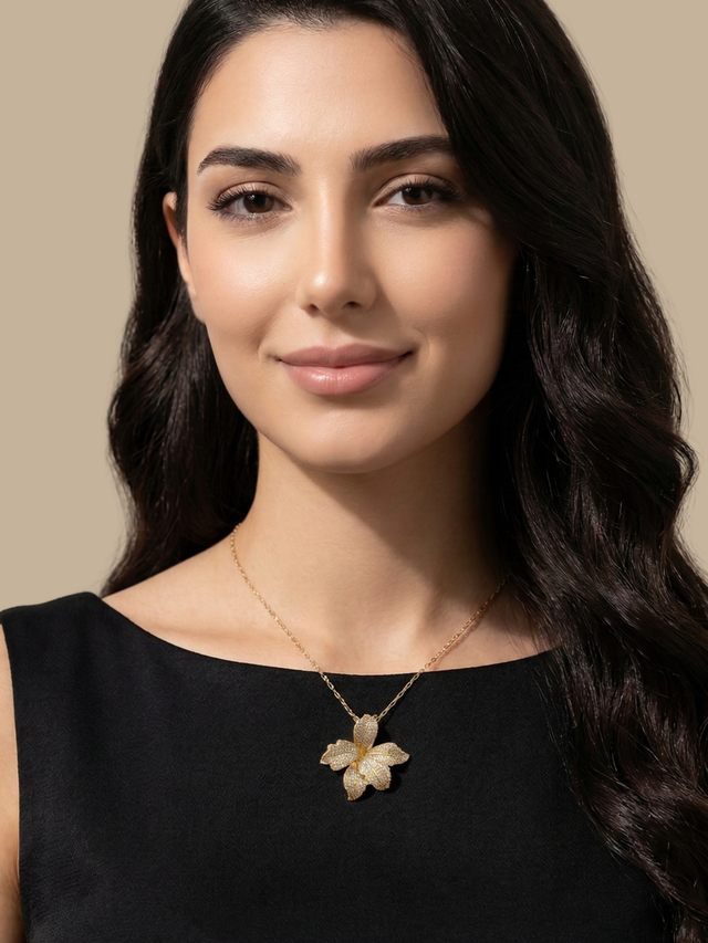 Model Wearing Orchid Bloom Brooch in 18k Gold Plated Metal Comfort Fit 18K Brass 925 Sterling Silver One Size