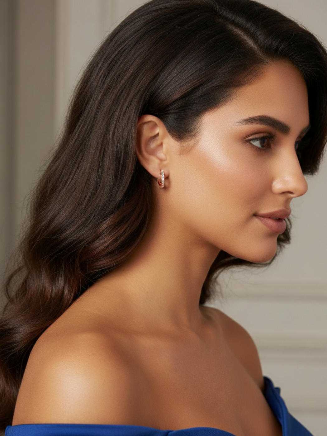 Alternate View of Model Wearing Lana Huggie Hoop Earrings in Sterling Silver with 18K Rose Gold Plating Jewelry for Pierced Ears 18k Plated 925 Metal Stone One Size 1.9gms