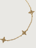 Closeup of Irene Star Charm Bracelet in 18K Gold Plated Sterling Silver Adjustable Length 18k 925 Metal Stone 7.5 inches 1.4gms