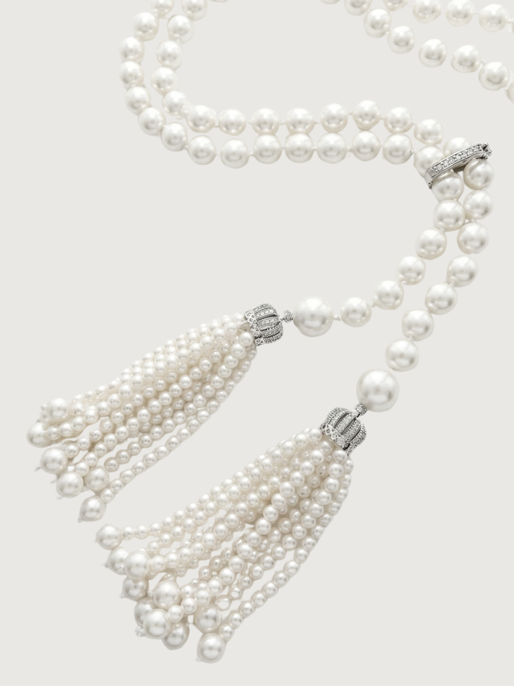 Closeup of Hessa Tassel Pearl Necklace with Brass clip Fixed Length Rhodium Plated 32 inches 72.2gms