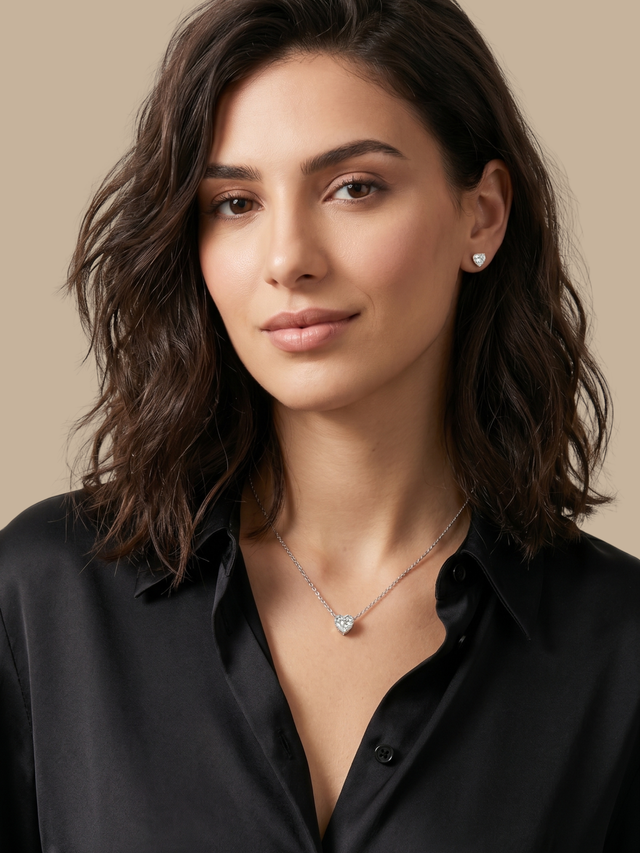 Model Wearing Serafina Solitaire Heart Pendant and Stud Earrings Adjustable Length 925 Sterling Silver One Size 3.4gms