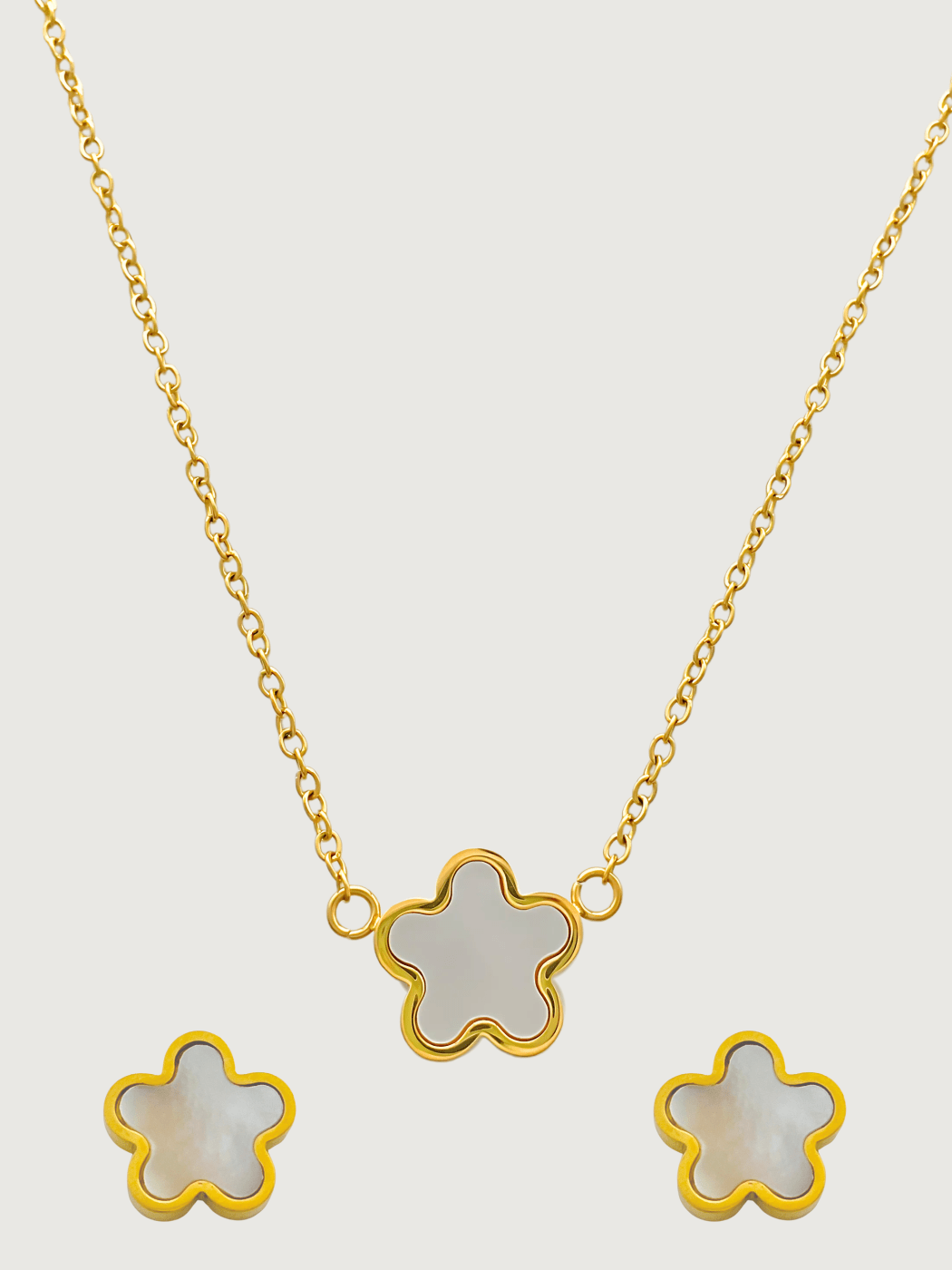 Front View of Freya Flower Pendant & Stud Earrings Set in 18k Gold-Plated Metal Adjustable Length Gold Plated Steel | Hypoallergenic Tarnish Resistant Sweat Water One Size 12gms