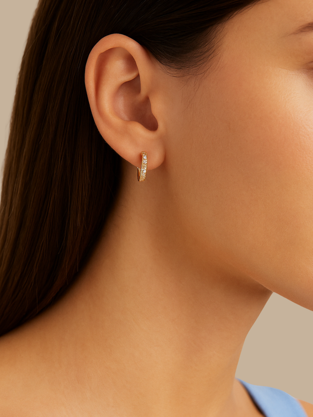 Model Wearing Lana Huggie Hoop Earrings Jewelry for Pierced Ears 18k Gold Plated 925 Sterling Silver 12.81 mm 2gms