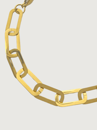 Closeup of Clarisse Chunky Paperclip Bracelet in 18k Gold-Plated Metal Adjustable Length Gold Plated Steel | Hypoallergenic Tarnish Resistant Sweat Water Eco - Friendly 7 inches 8.3gms