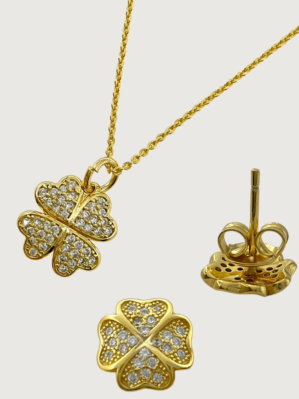 Closeup of Cara Clover Pendant Necklace and Earrings in 18k Gold Plated Sterling Silver Fixed Length 925 Metal 16 inches 4.3gms