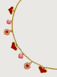 Closeup of Little Princess Hearts and Flower Charm Necklace in 18k Gold Plated Silver Adjustable Length 925 Sterling Metal 14 inches 7.2gms