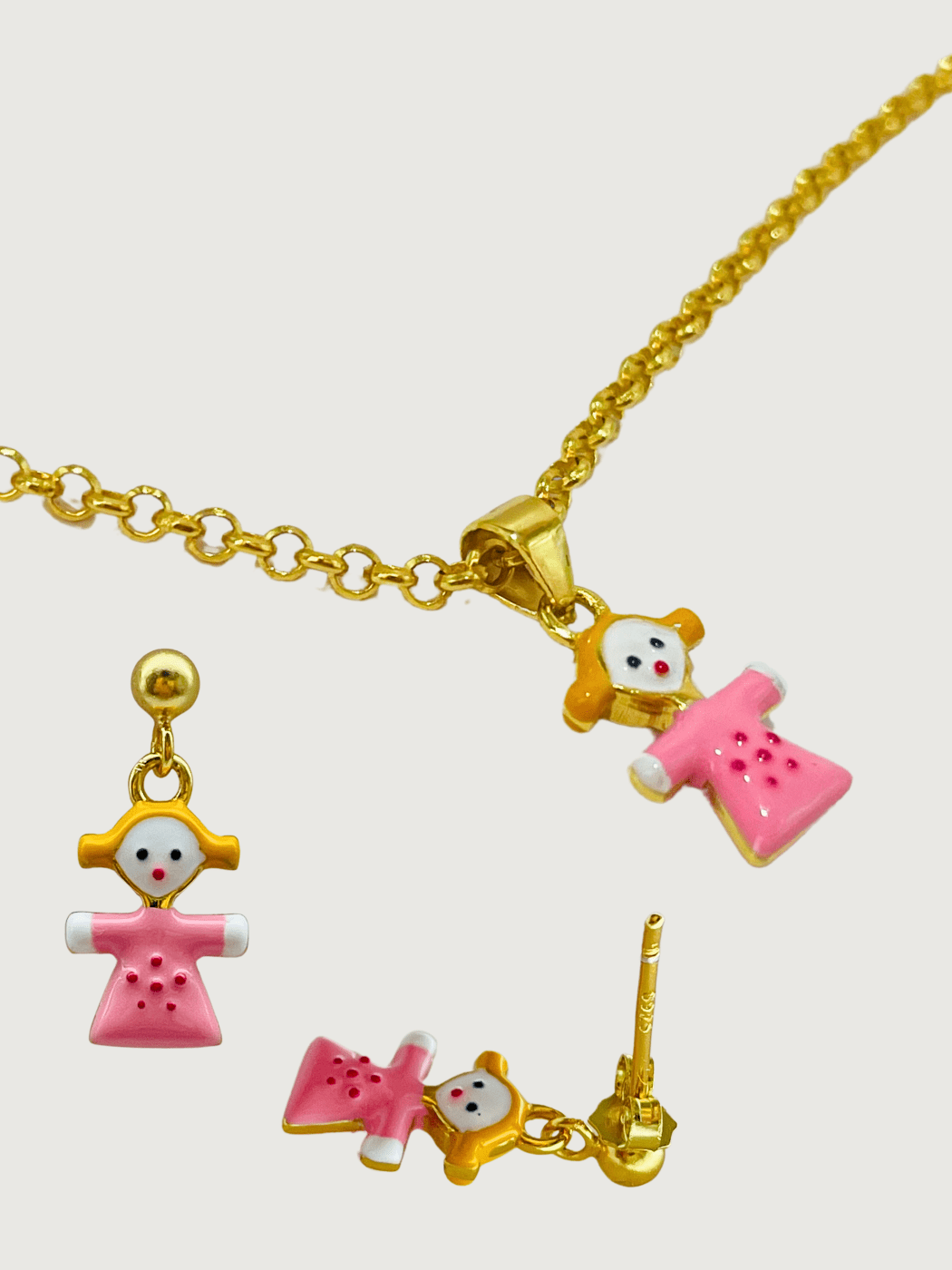 Closeup of Little Princess Dolly Pendant Necklace and Dangle Earrings in 18K Gold Plated Sterling Silver Adjustable Length 18k 925 Metal 14 inches 6.3gms