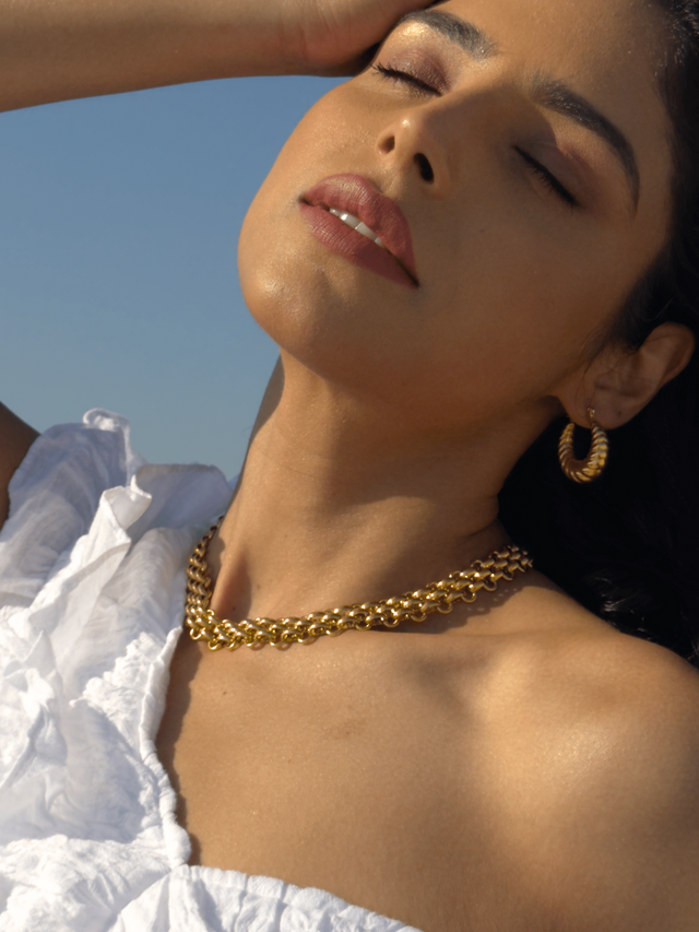 Model Wearing Clara Chunky Necklace in 18K Gold Plated Metal Adjustable Length 18k Steel | Hypoallergenic Tarnish Resistant Sweat Water Eco - Friendly 15 inches 56.2gms