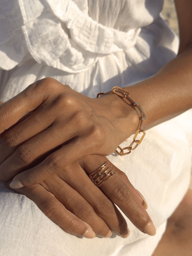 Model Wearing Clarisse Chunky Paperclip Bracelet in 18k Gold-Plated Metal Adjustable Length Gold Plated Steel | Hypoallergenic Tarnish Resistant Sweat Water Eco - Friendly 7 inches 8.3gms