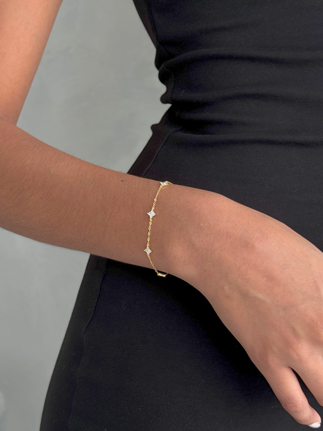Model Wearing Irene Star Charm Bracelet in 18K Gold Plated Sterling Silver Adjustable Length 18k 925 Metal Stone 7.5 inches 1.4gms