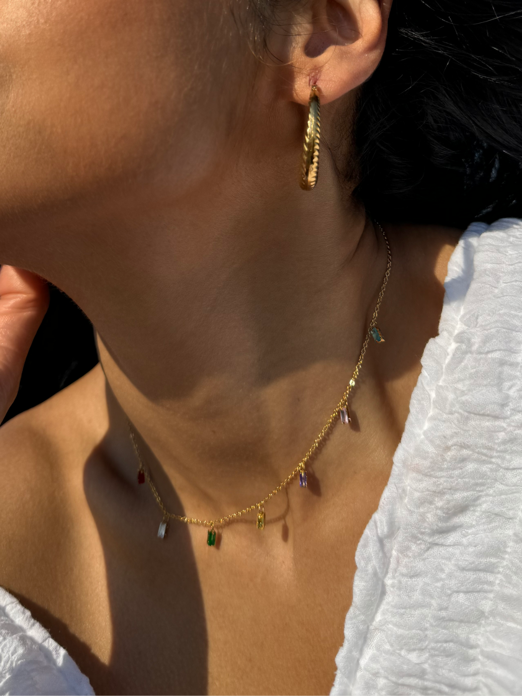 Model Wearing Kiara Charm Necklace in 18k Gold-Plated Metal Adjustable Length Gold Plated Steel | Hypoallergenic Tarnish Resistant Sweat Water Eco - Friendly One Size 2.6gms