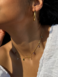 Model Wearing Kiara Charm Necklace in 18k Gold-Plated Metal Adjustable Length Gold Plated Steel | Hypoallergenic Tarnish Resistant Sweat Water Eco - Friendly One Size 2.6gms