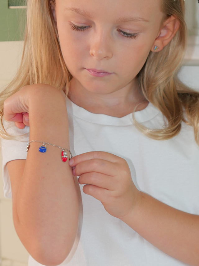 Model Wearing Little Princess Enamel Charm Bracelet in Sterling Silver Adjustable Length 925 Metal 11.5 cm 4.6gms