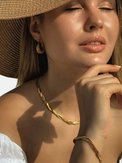 Alternate View of Model Wearing Raia Ripple Bracelet in 18K Gold Plated Metal Adjustable Length 18k Steel | Hypoallergenic Tarnish Resistant Sweat Water Eco - Friendly One Size 5.1gms