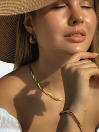 Alternate View of Model Wearing Raia Ripple Bracelet in 18K Gold Plated Metal Adjustable Length 18k Steel | Hypoallergenic Tarnish Resistant Sweat Water Eco - Friendly One Size 5.1gms
