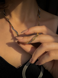 Model Wearing Raia Two-tone Ripple Necklace in 18K Gold Plated Metal Adjustable Length Two Tone | Tarnish Resistant Steel Water Hypoallergenic Durable Jewelry Sweat Eco - Friendly One Size 11gms