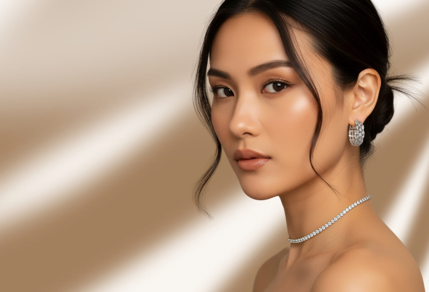 Elegant woman wearing sparkling cubic zirconia choker necklace and statement earrings from The Jewels Jar