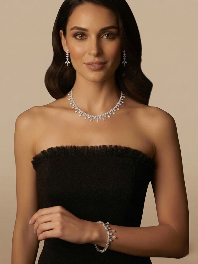 Model Wearing Evie Necklace with bracelet Earrings and Ring in Rhodium Plated Metal Comfort Fit Copper One Size 29.4gms Mix