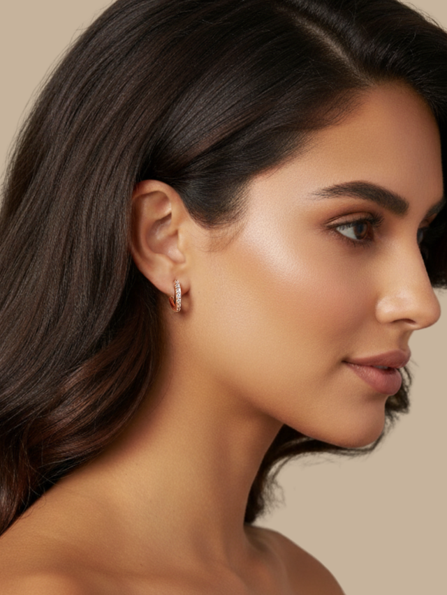 Model Wearing Lana Huggie Hoop Earrings Jewelry for Pierced Ears 18k Rose Gold Plated 925 Sterling Silver One Size 1.9gms