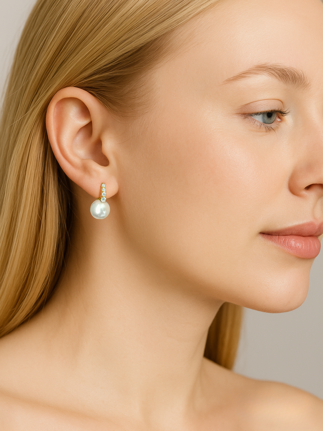 Model Wearing Bianca Pearl Huggie Hoop Earrings in 18k Gold Plated Sterling Silver Jewelry for Pierced Ears 925 Metal Stone 2 cm 3.7gms